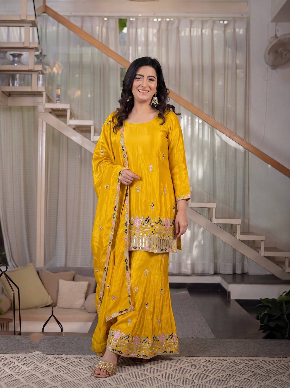 Elegant Rust Orange Silk Kurta and Flared Palazzo Set Adorned with Intricate Multicolored Botanical Embroidery and Mirror Work